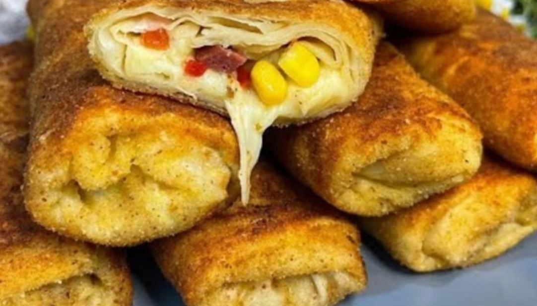 10 dakikada pizza tadında çıtır börek! İşte parmaklarınızı yediren nefis tarif...